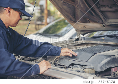 Mechanic car service auto garage in automotive mobile center. Technician workshop repair engine motor vehicles service mechanical engineering business. Automobile mechanic hands car repairs technic Mechanic car service auto garage in automotive mobile center. Technician workshop repair engine motor vehicles service mechanical engineering business. Automobile mechanic hands car repairs technic 83746378