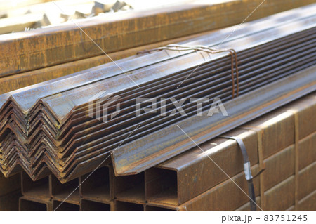 Metal profiles of different kinds are located in the metal products warehouse Metal profiles of different kinds are located in the metal products warehouse 83751245