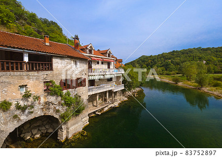Old Bridge in Rijeka Crnojevica River near Skadar Lake - Montenegro 83752897