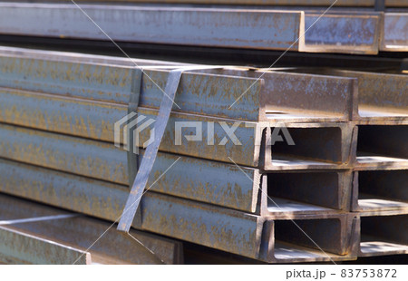 Metal profiles of different kinds are located in the metal products warehouse 83753872