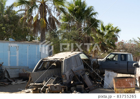 old abandoned car in junkyard in Baja California Sur Mexico old abandoned car in junkyard in Baja California Sur Mexico 83755265