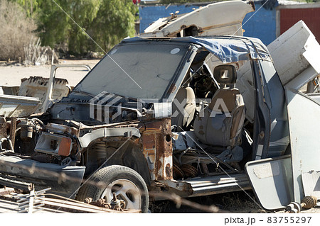 old abandoned car in junkyard in Baja California Sur Mexico old abandoned car in junkyard in Baja California Sur Mexico 83755297