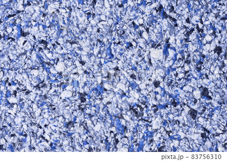 Abstract textured wallpaper. Decorative texture. Colored texture of liquid wallpaper to cover wall surface. Colored abstract background. Abstract texture of decorative plaster liquid wallpaper 83756310