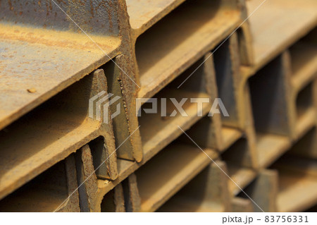 Metal profile beam in packs at the warehouse of metal products 83756331