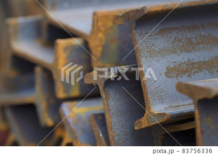 Metal profile beam in packs at the warehouse of metal products Metal profile beam in packs at the warehouse of metal products 83756336