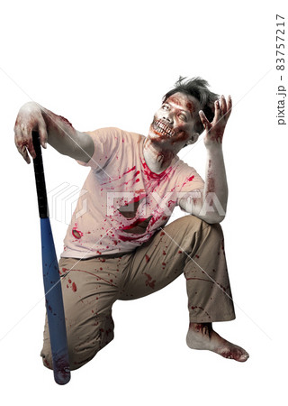 Scary zombie with blood and wound on his body holding baseball bat standing 83757217