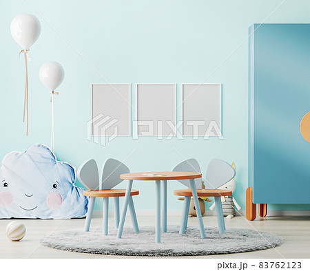 Blank frame mock up in blue children room interior with kids table and toys, child playroom interior background, 3d rendering 83762123