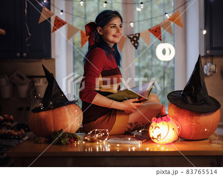 All hallows eve. woman in witch costume All hallows eve. woman in witch costume 83765514