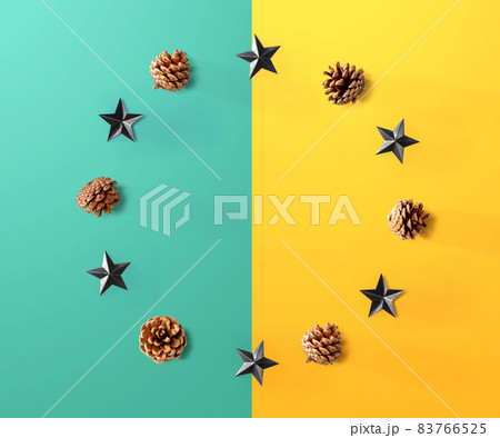 Christmas pinecones with star ornaments Christmas pinecones with star ornaments 83766525