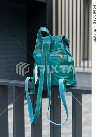 Tiffany leather backpack on the metal fence Tiffany leather backpack on the metal fence 83769464