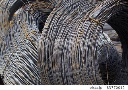 Thin metal reinforcement wound into bays at the metal products warehouse Thin metal reinforcement wound into bays at the metal products warehouse 83770012