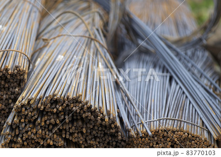 Reinforcing bars with a periodic profile in the packs are stored in the metal products warehouse Reinforcing bars with a periodic profile in the packs are stored in the metal products warehouse 83770103