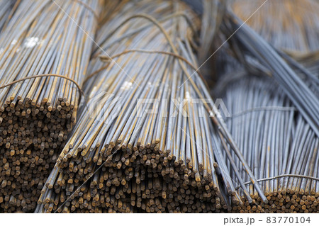 Reinforcing bars with a periodic profile in the packs are stored in the metal products warehouse Reinforcing bars with a periodic profile in the packs are stored in the metal products warehouse 83770104