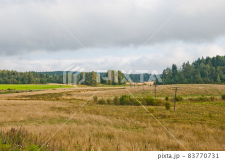 Autumn landscape in Karelia with a field Autumn landscape in Karelia with a field 83770731