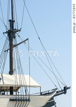 an old sailing ship on a blue sky background an old sailing ship on a blue sky background 83772845