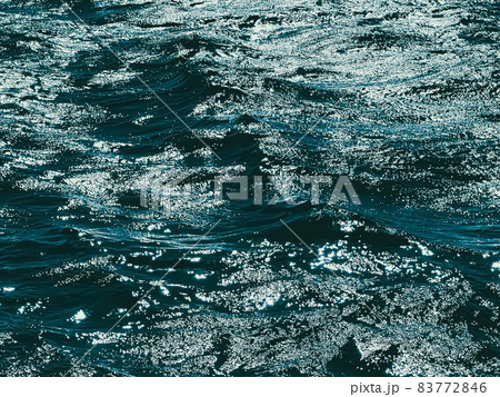 Sea, texture and coastal nature concept. Blue ocean water as surface background, flowing waves and summer holiday travel Sea, texture and coastal nature concept. Blue ocean water as surface background, flowing waves and summer holiday travel 83772846