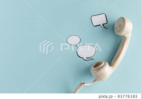 Top view of chat bubbles with telephone receiver and copy space Picture on . High quality beautiful photo concept Top view of chat bubbles with telephone receiver and copy space Picture on . High quality beautiful photo concept 83776183