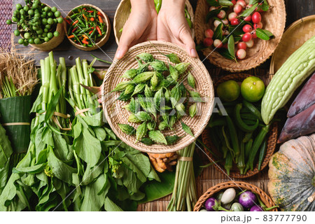 Fresh organic Southeast Asian vegetables and spices from local farmer market, Thailand 83777790