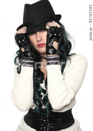 Woman With Sweater and Fedora on White Background 83783585