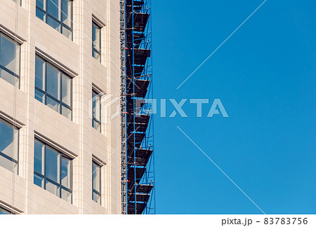 Modern facade steel cladding architectural elements detail. Exterior architectural detail facade building. Modern facade steel cladding architectural elements detail. Exterior architectural detail facade building. 83783756