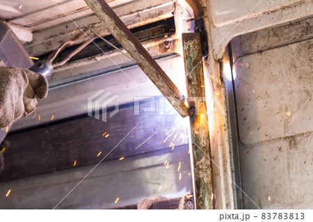 Worker welding the steel part by manual Worker welding the steel part by manual 83783813