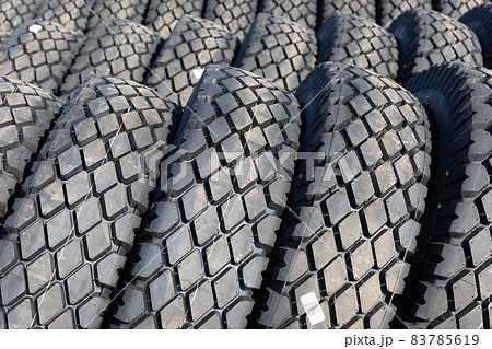 Photo of black big tires on wheels for large cars Photo of black big tires on wheels for large cars 83785619