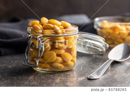 Pickled yellow Lupin Beans in jar. 83788265
