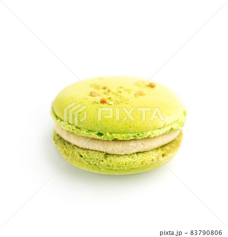 green round baked almond flour macaron isolated on a white background 83790806