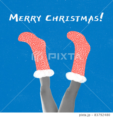 Contemporarty art collage of female legs wearing drawn res socks isolated over blue background. Christmas and New Year concept 83792480
