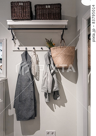 Place for outerwear in the hallway, home interior. Place for outerwear in the hallway, home interior. 83795014