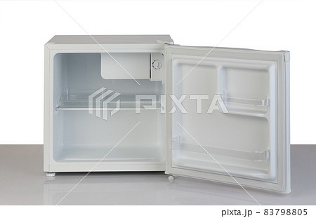 Small opened refrigerator with empty space isolated on white Small opened refrigerator with empty space isolated on white 83798805