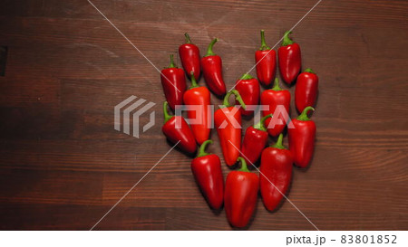 Chili red hot pepper on the table. Chili red hot pepper on the table. 83801852