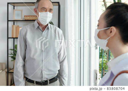 Senior Man Talking to Doctor 83808704
