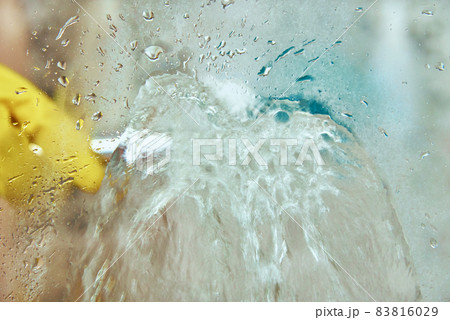 Woman cleaning bathroom cabine Woman cleaning bathroom cabine 83816029