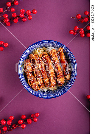 Katsudon fried chicken with rice in a bowl 83817028