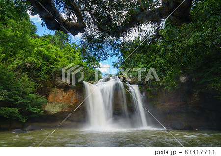 Beautiful waterfall with sunlight in jungle, Haew Suwat Waterfall at khao yai Nakhonratchasima province Beautiful waterfall with sunlight in jungle, Haew Suwat Waterfall at khao yai Nakhonratchasima province 83817711