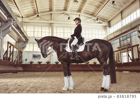 woman jockey with his horse woman jockey with his horse 83818795