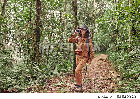 Beautiful young female caucasian tourist in equatorial africa jungles Beautiful young female caucasian tourist in equatorial africa jungles 83820818
