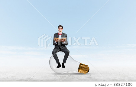 young businessman with a book 83827100