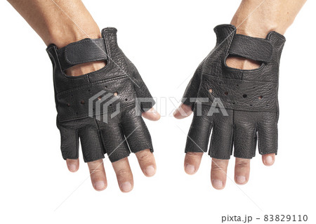 Hands in drivers male leather gloves isolated on a white 83829110