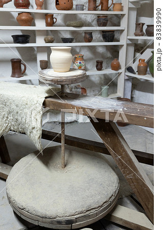 Pottery workshop studio, vertical photo with pot Pottery workshop studio, vertical photo with pot 83839990