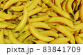 Abstract background with fresh ripe yellow bananas. Close-up. 83841709