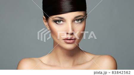 Beautiful woman face. sensual amazing model girl with beautiful make-up Beautiful woman face. sensual amazing model girl with beautiful make-up 83842562