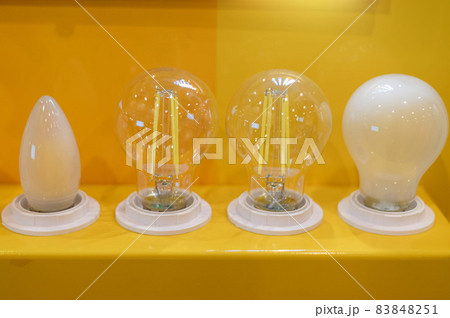 Several light bulbs in the table. Lighting sample. Several light bulbs in the table. Lighting sample. 83848251