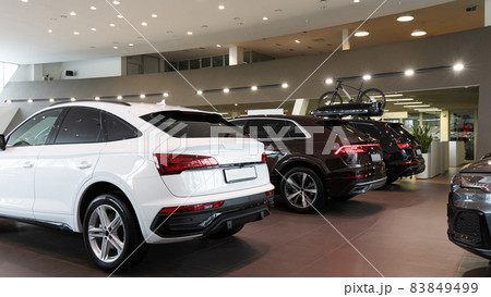 modern luxury SUVs in the showroom modern luxury SUVs in the showroom 83849499