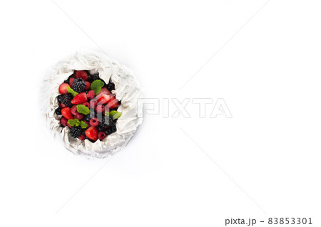 Delicious Pavlova cake with meringue and fresh berrie Delicious Pavlova cake with meringue and fresh berrie 83853301