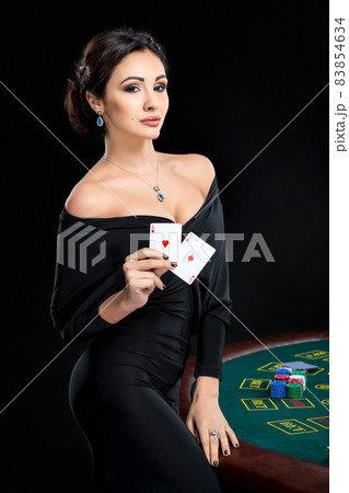 sexy woman with poker cards and chips 83854634