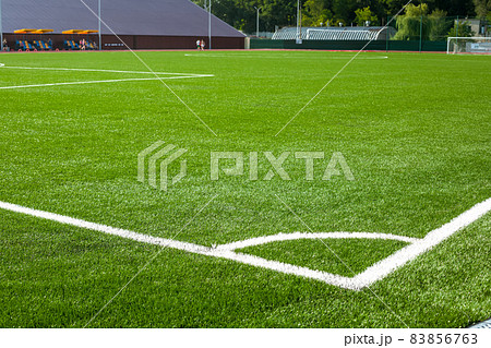 Football soccer field corner with white marks Football soccer field corner with white marks 83856763
