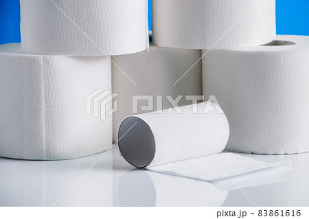 Rolls of toilet paper on a white background. Panic purchase of essential goods.Shortage of goods in the supermarket. The coronavirus epidemic in the world. Rolls of toilet paper on a white background. Panic purchase of essential goods.Shortage of goods in the supermarket. The coronavirus epidemic in the world. 83861616