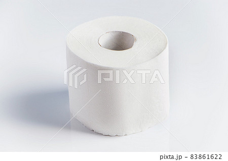 One roll of toilet paper on a white background. Panic purchase of essential goods. Place for text. One roll of toilet paper on a white background. Panic purchase of essential goods. Place for text. 83861622